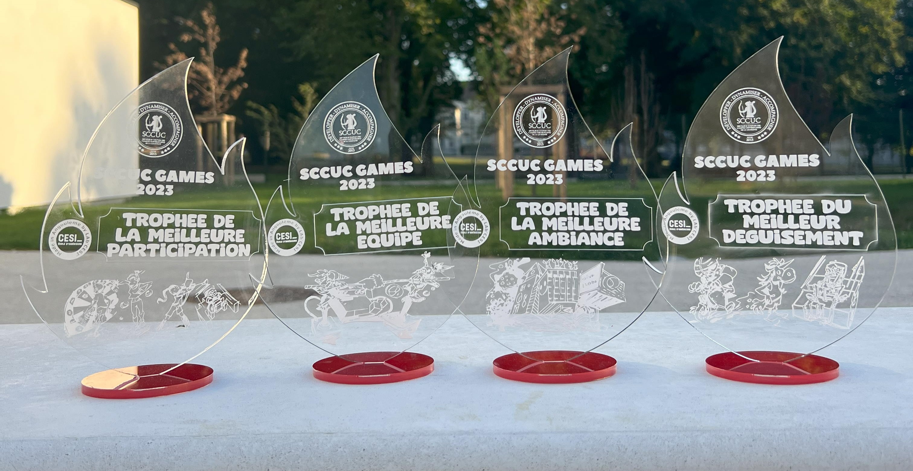 photo des 4 trophées du sccuc games
